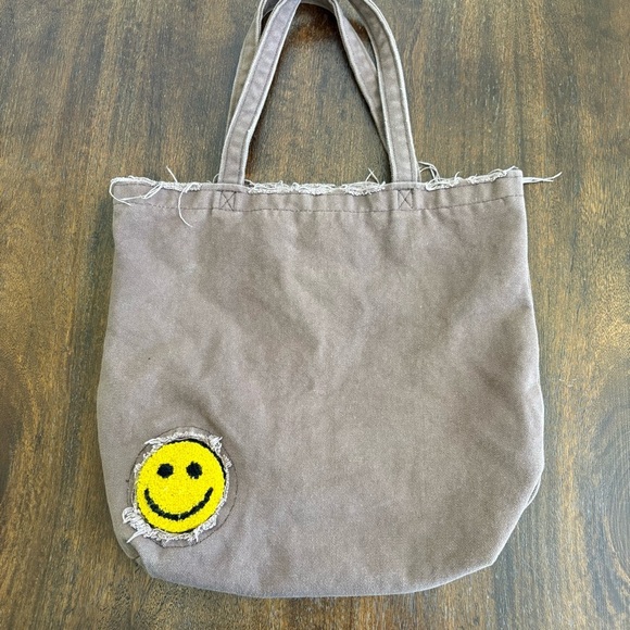 Urban Outfitters Handbags - Urban Outfitters Smiley Dark Brown Canvas Tote Book Fringe Bag OS